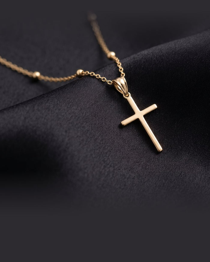 Enzomar solid gold jewelry on dark satin