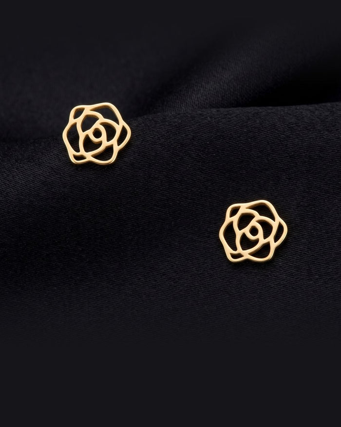 Enzomar solid gold jewelry on dark satin