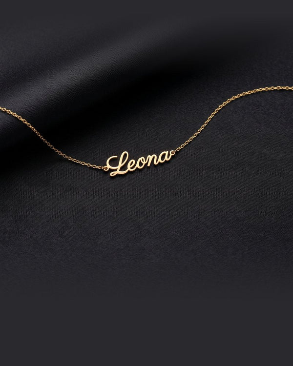 Enzomar solid gold jewelry on dark satin